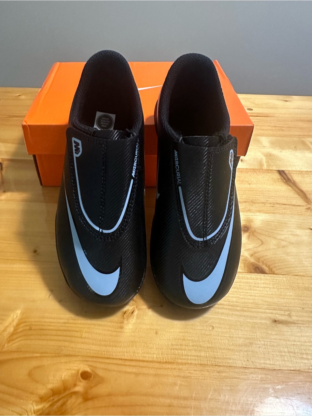 Nike Kids Black Sneakers with White Swoosh